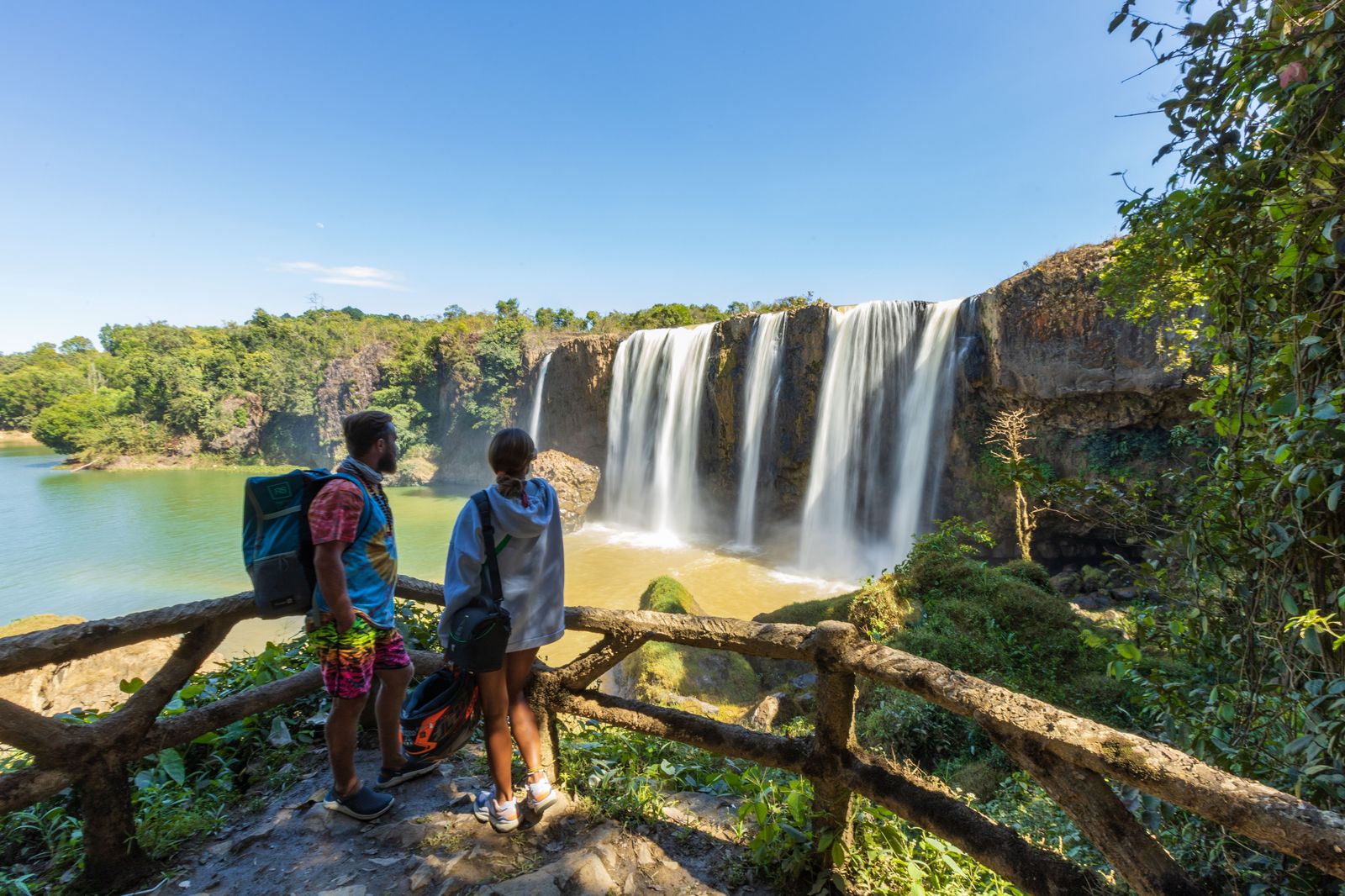 Visitors at the railing above the Horseshoe Falls, the first stop on most chauffeured Niagara days