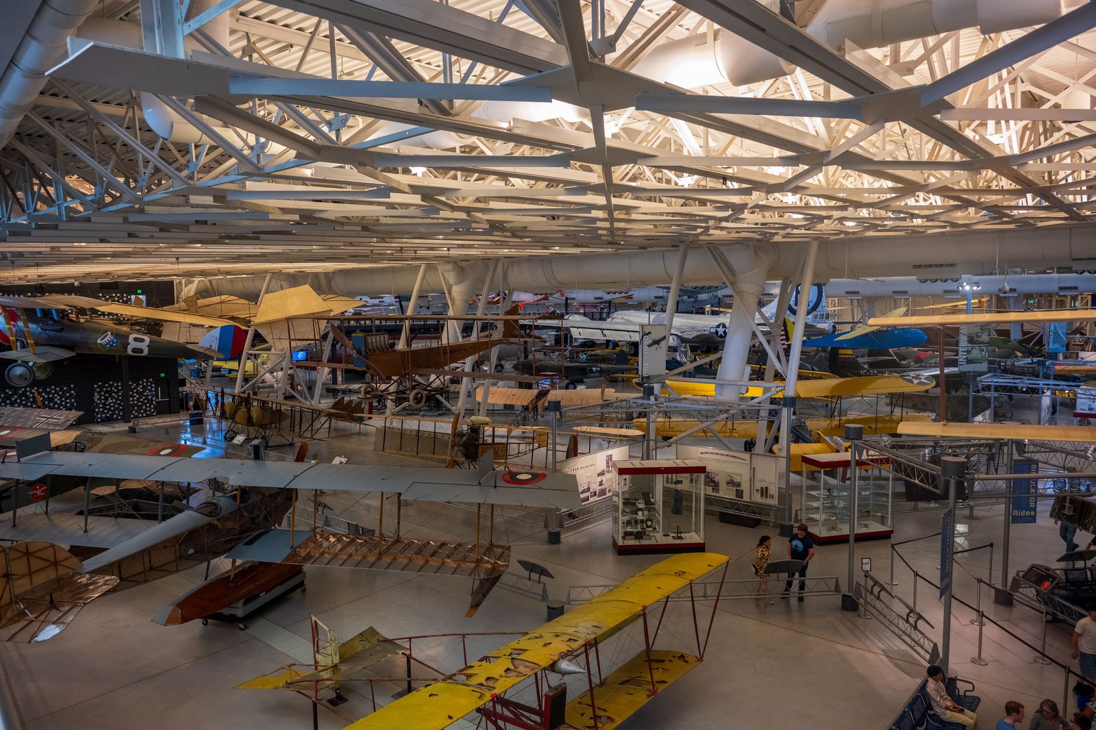 Historic aircraft on display inside an aviation museum hangar