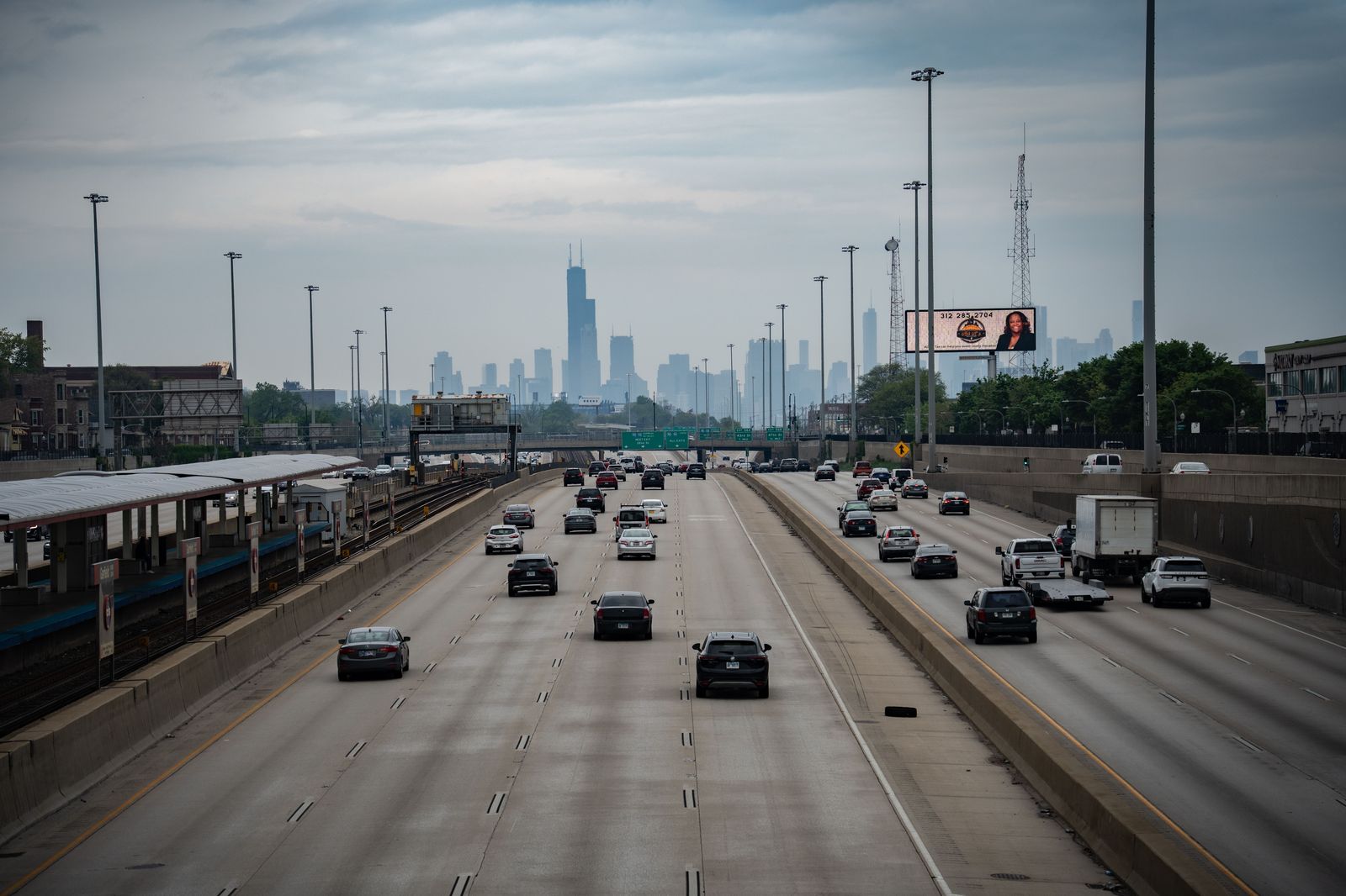 Traffic on a highway into Toronto with the skyline ahead, the busiest leg of a GTA meeting day