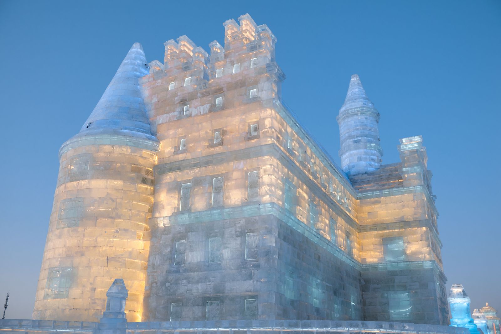 Ice sculpture on a snowy street during a winter wine festival