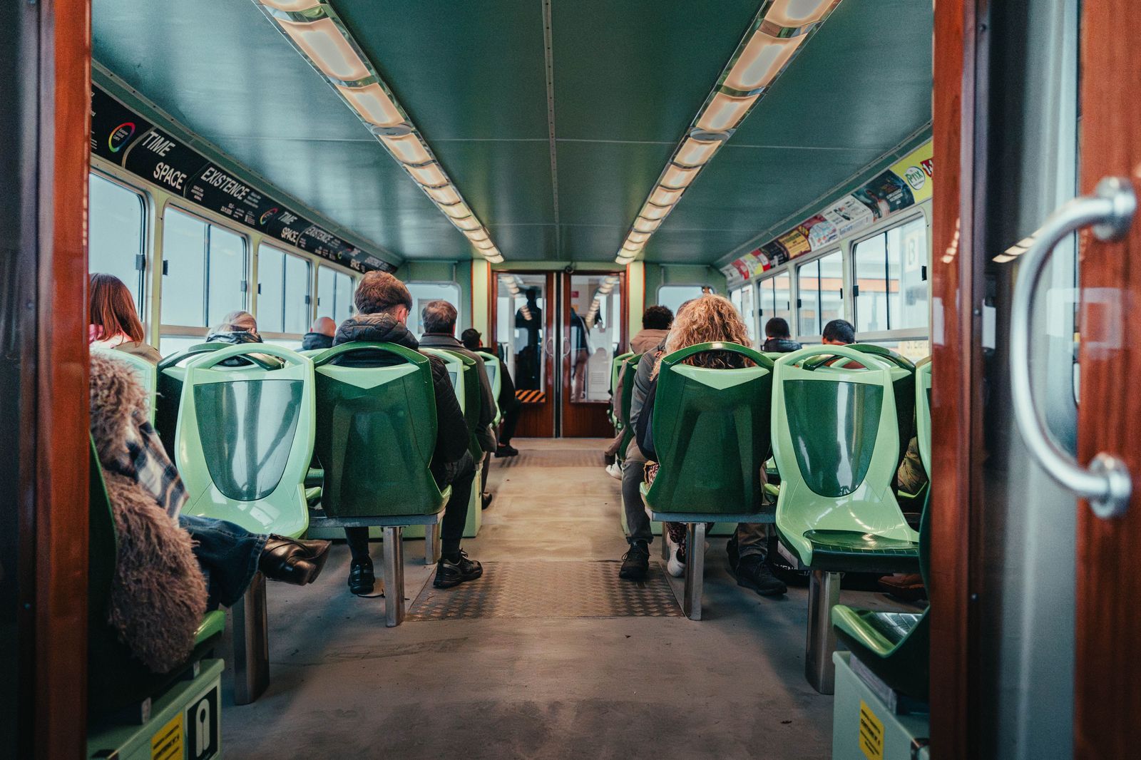 Passengers boarding an airport shuttle van, the budget way from London to Pearson