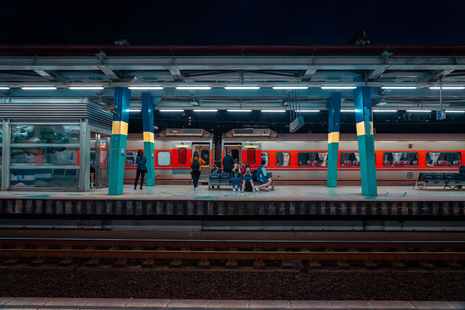 A commuter train at a station in the evening, the Milton line that runs to Toronto rather than Hamilton