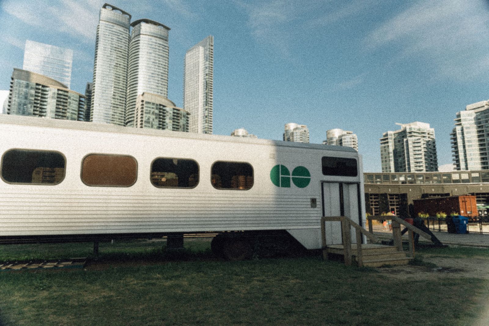 A double-decker commuter train at a lakeshore platform; the best choice for a solo commuter with light bags.