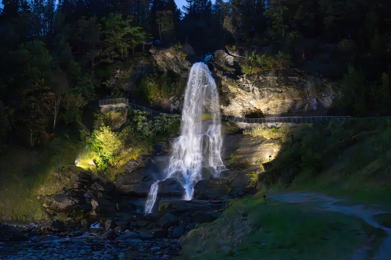 Niagara Falls lit up in colour after dark from the Canadian side