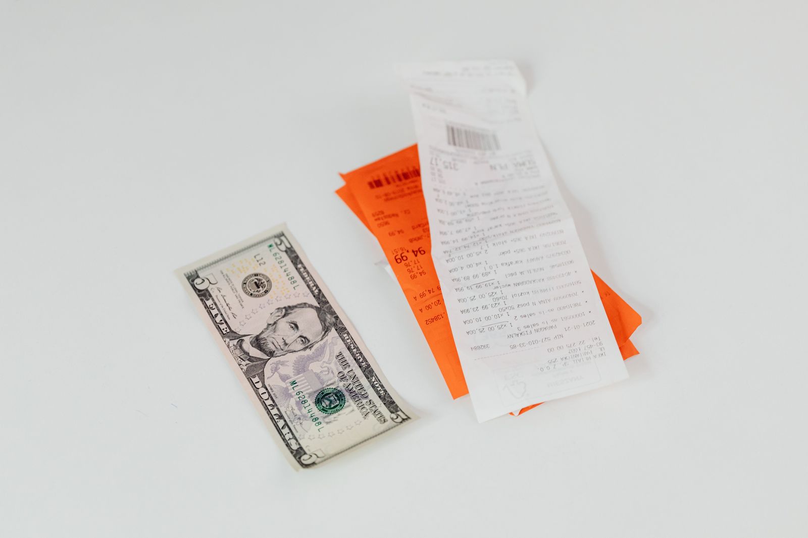 A printed receipt showing the final fare and tax lines
