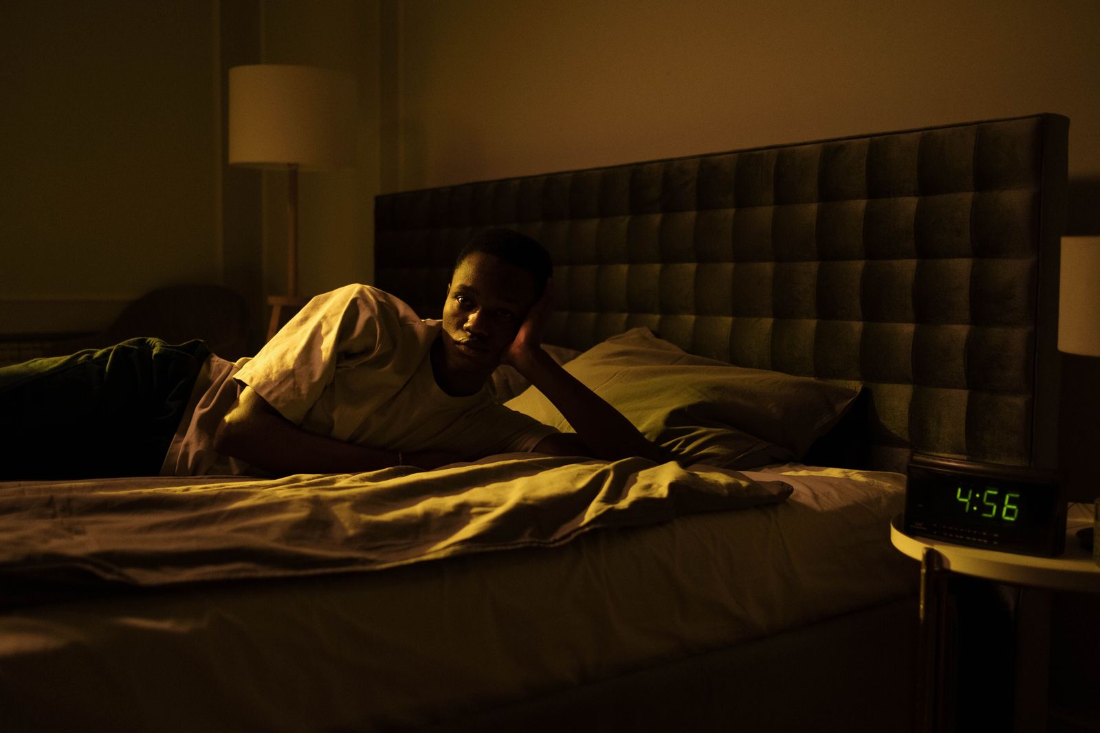 An alarm clock in the dark before an early start to the airport