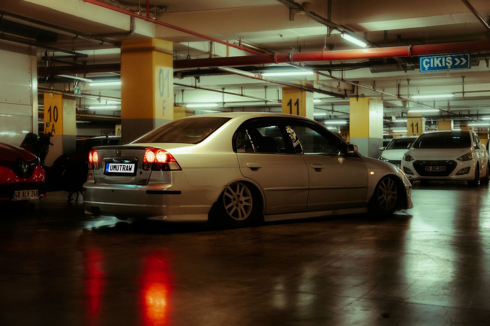 Rows of cars in a multi-storey parking garage
