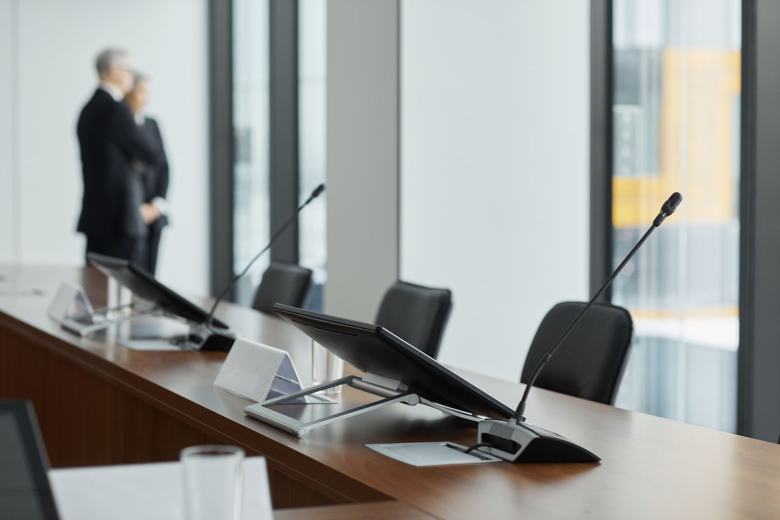 A boardroom table set for a meeting during an investor roadshow