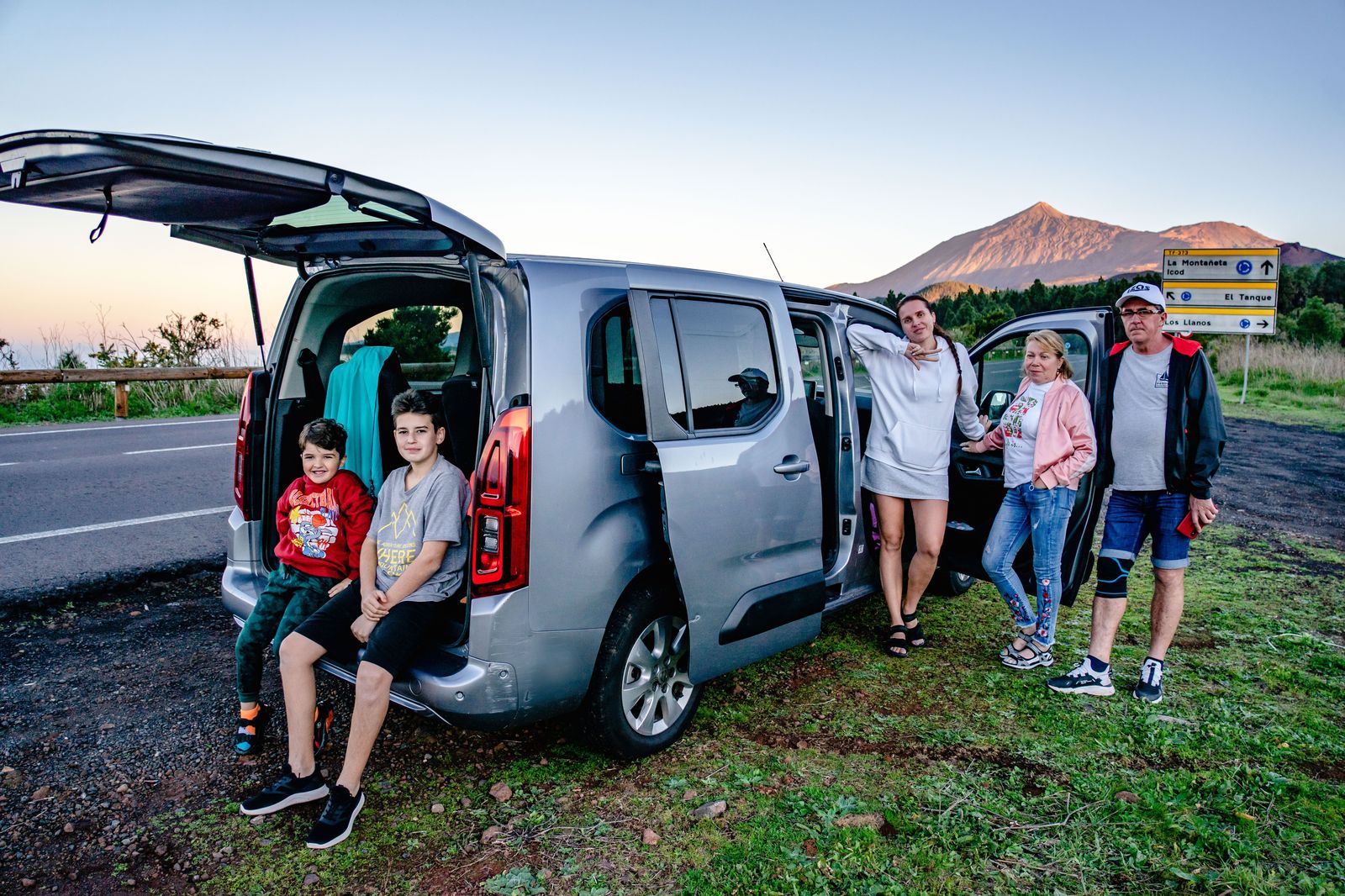 A black van parked for a family day trip