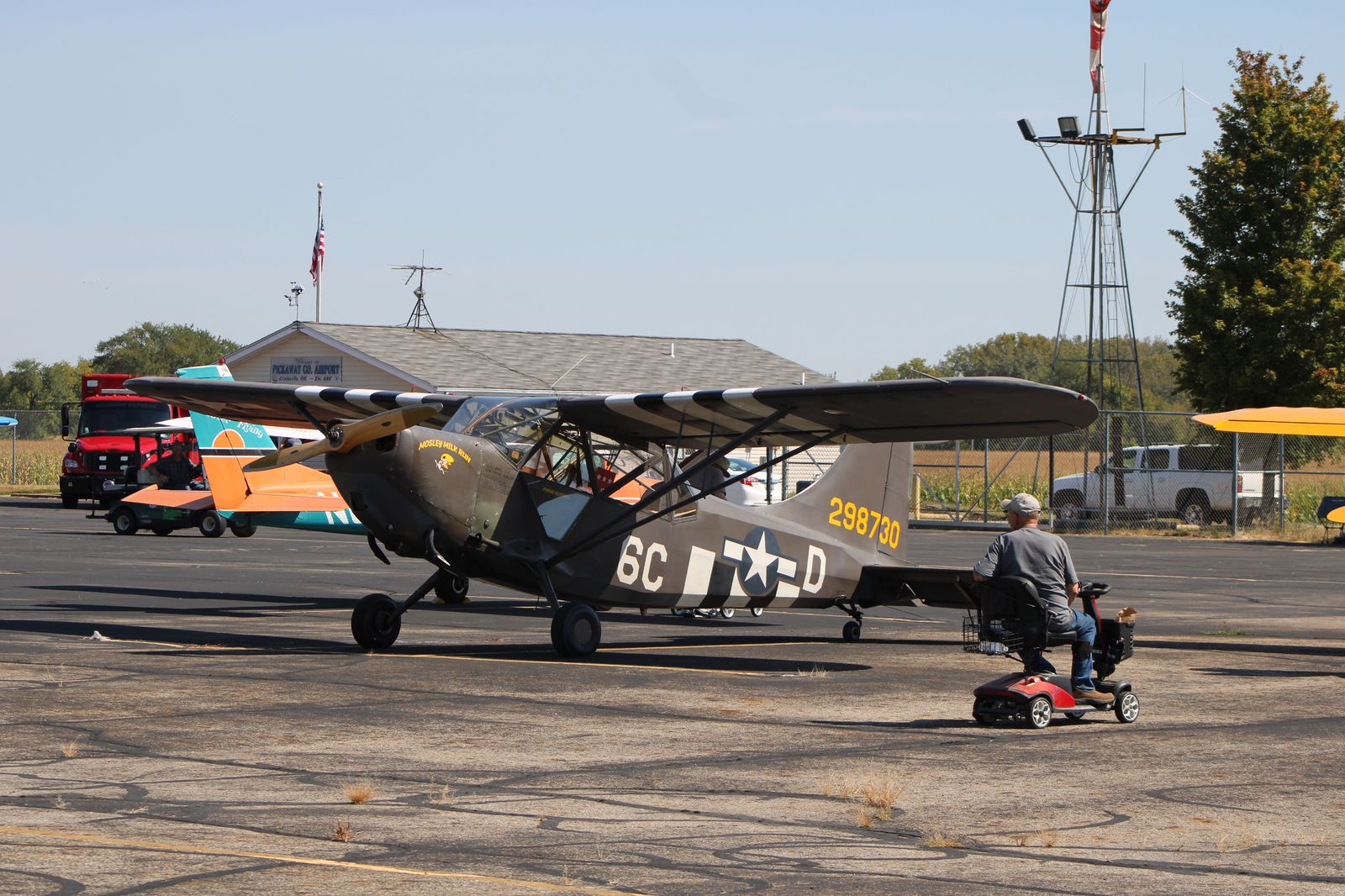 Restored vintage warplanes inside a museum hangar at Hamilton airport