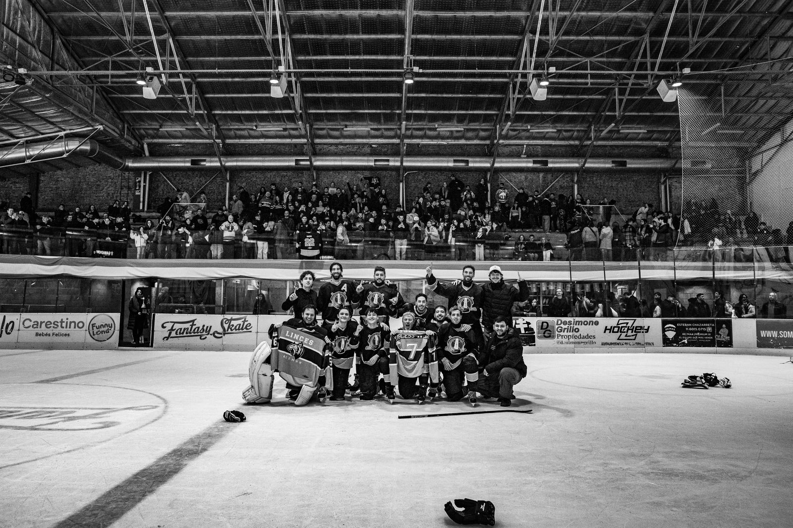 A crowd leaving a downtown Toronto arena after a game at night