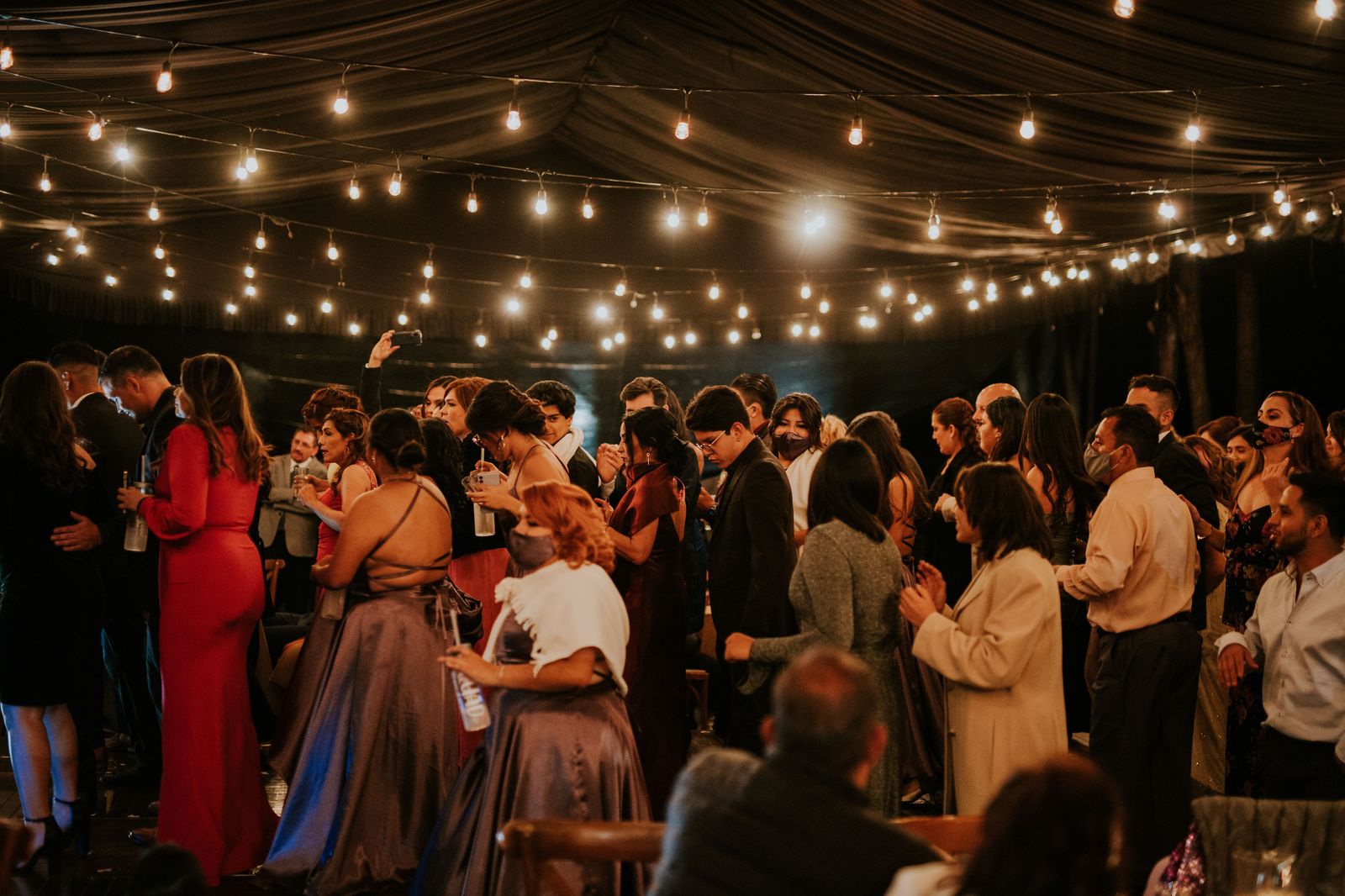 Wedding guests on the dance floor late in the evening, when the shuttle's last run matters most