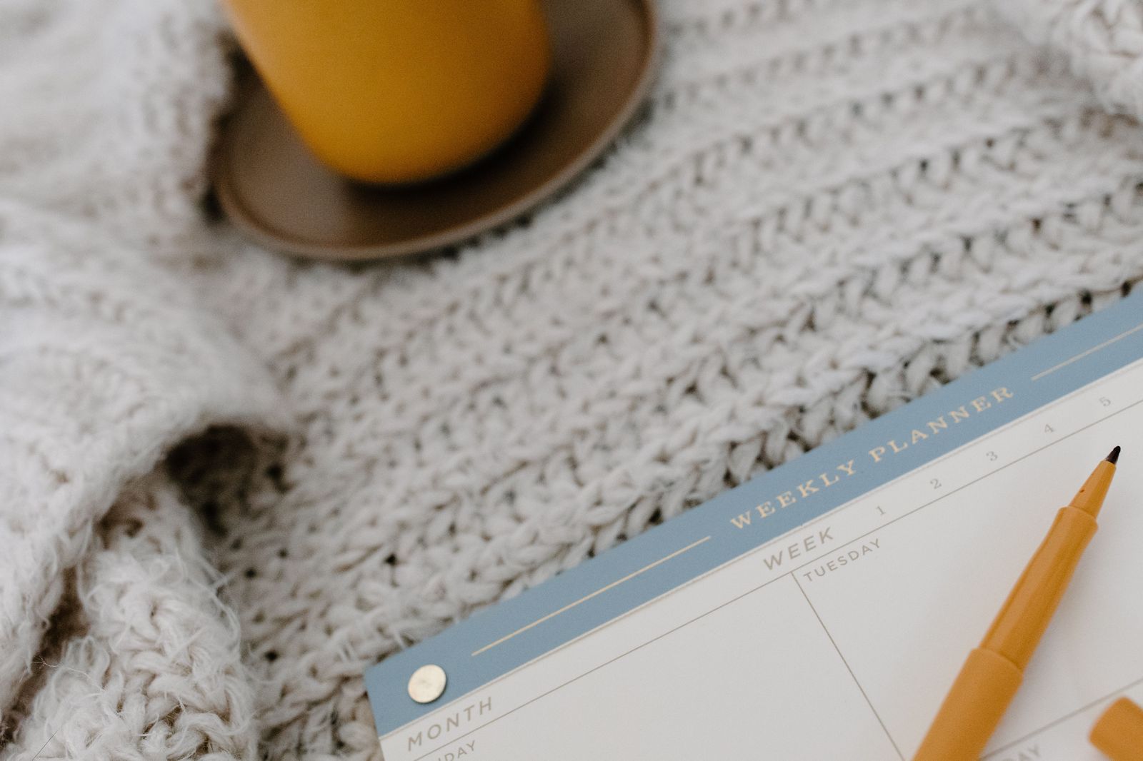 A weekly planner with a pen, used to set out a week of chauffeured days