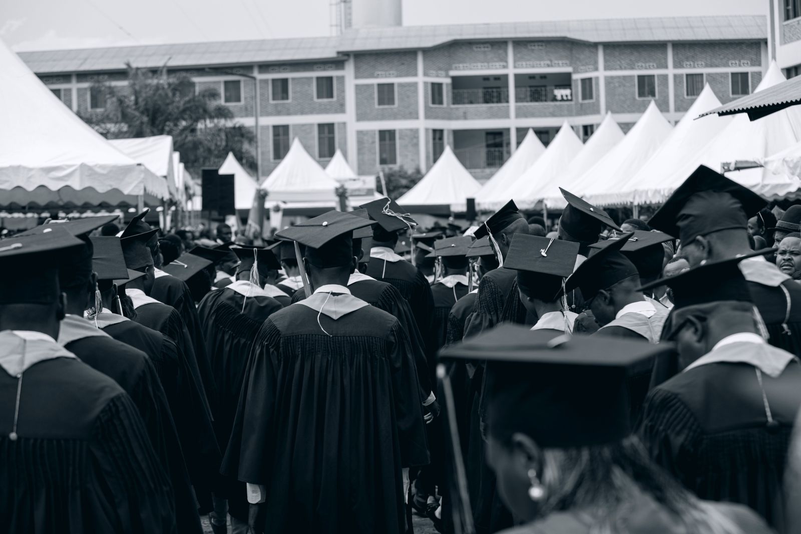 Graduates celebrate after convocation; families often book an hourly car for the ceremony and dinner.