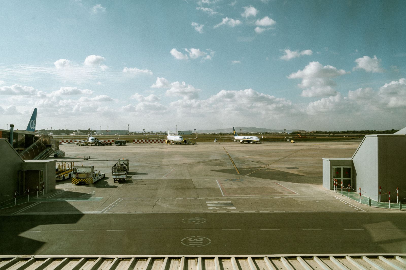 A small regional airport terminal and runway, like Waterloo airport in Breslau, a short drive from Kitchener.