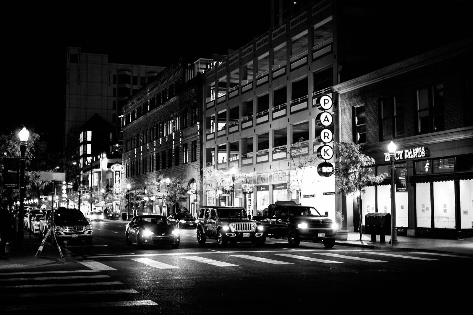 Black sedan waiting on a quiet downtown Hamilton side street near TD Coliseum on a concert night