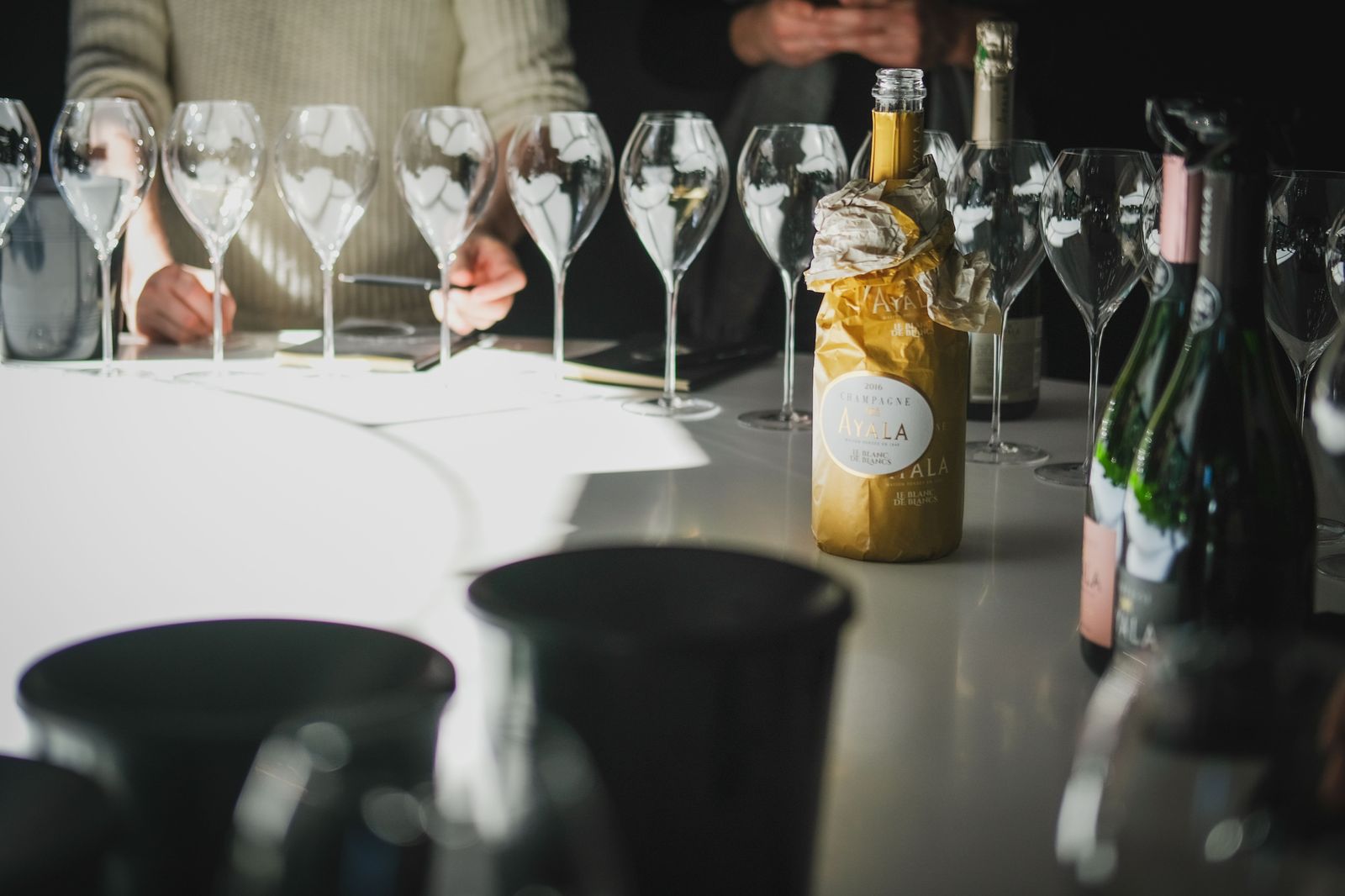 Glasses lined up for a tasting at a Niagara winery during the Grape & Wine Festival