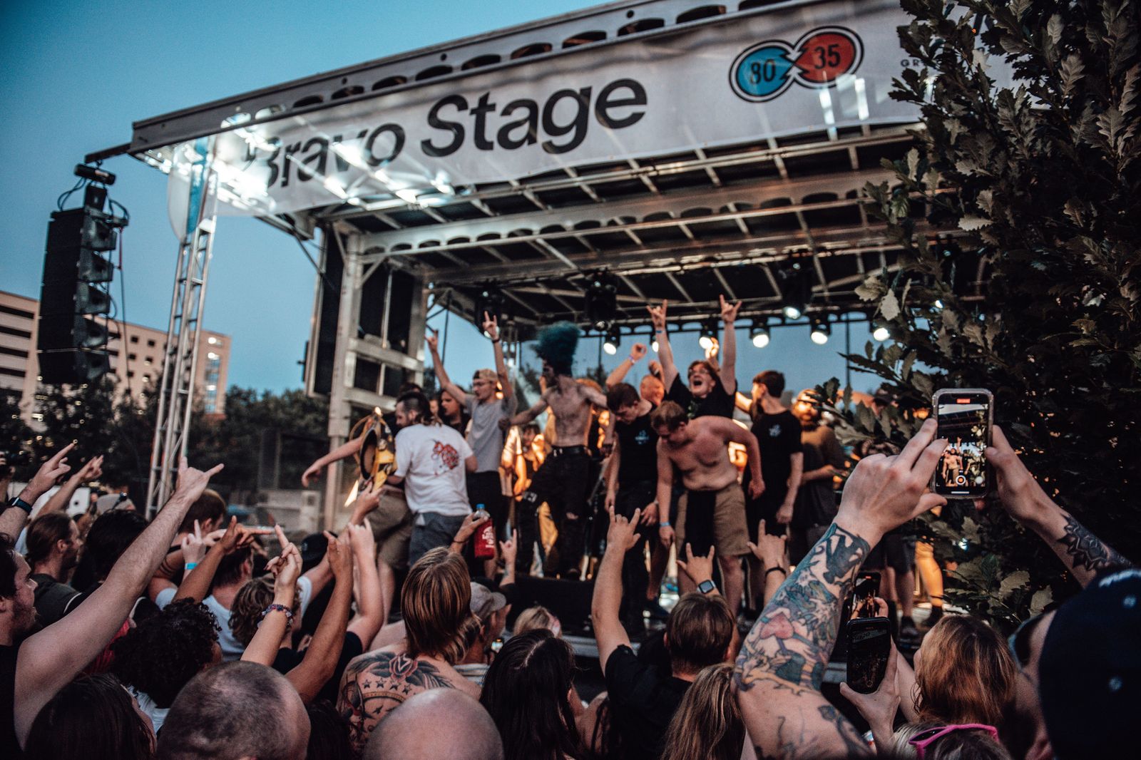 Outdoor stage and crowd on a warm September evening at a downtown street festival