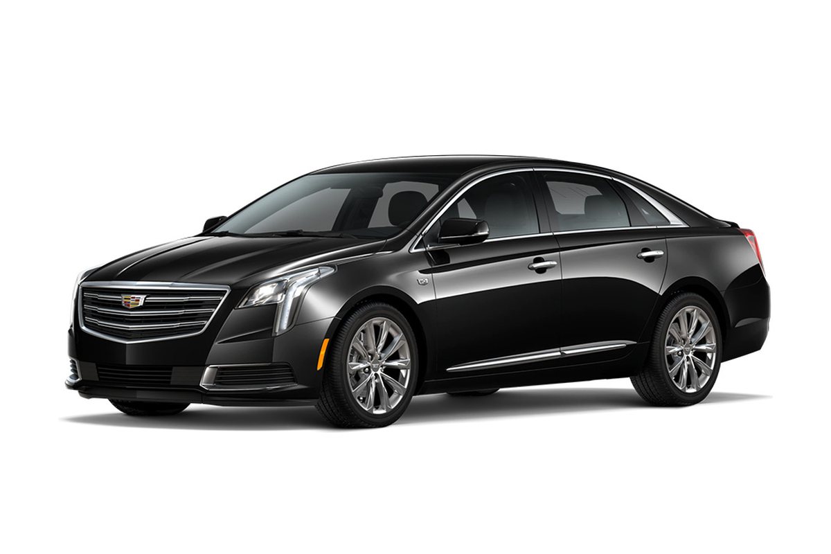 A black Cadillac XTS business sedan from the HamiltonLimo.net fleet