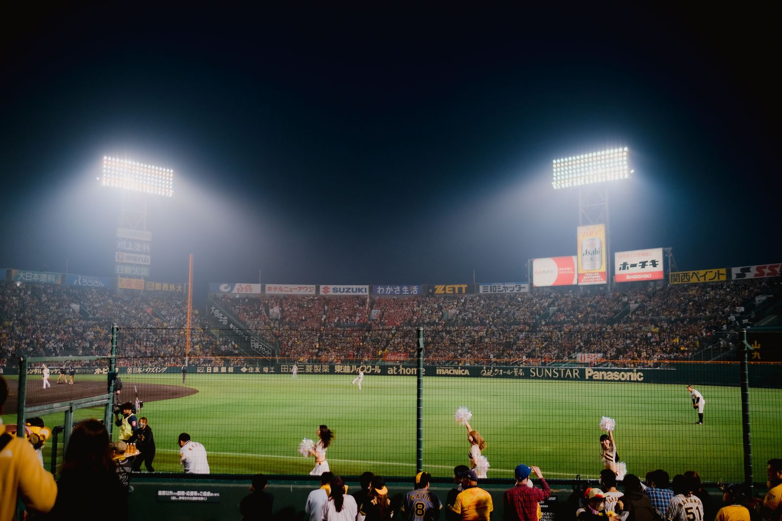A stadium crowd at a night game, when a planned pickup point matters most