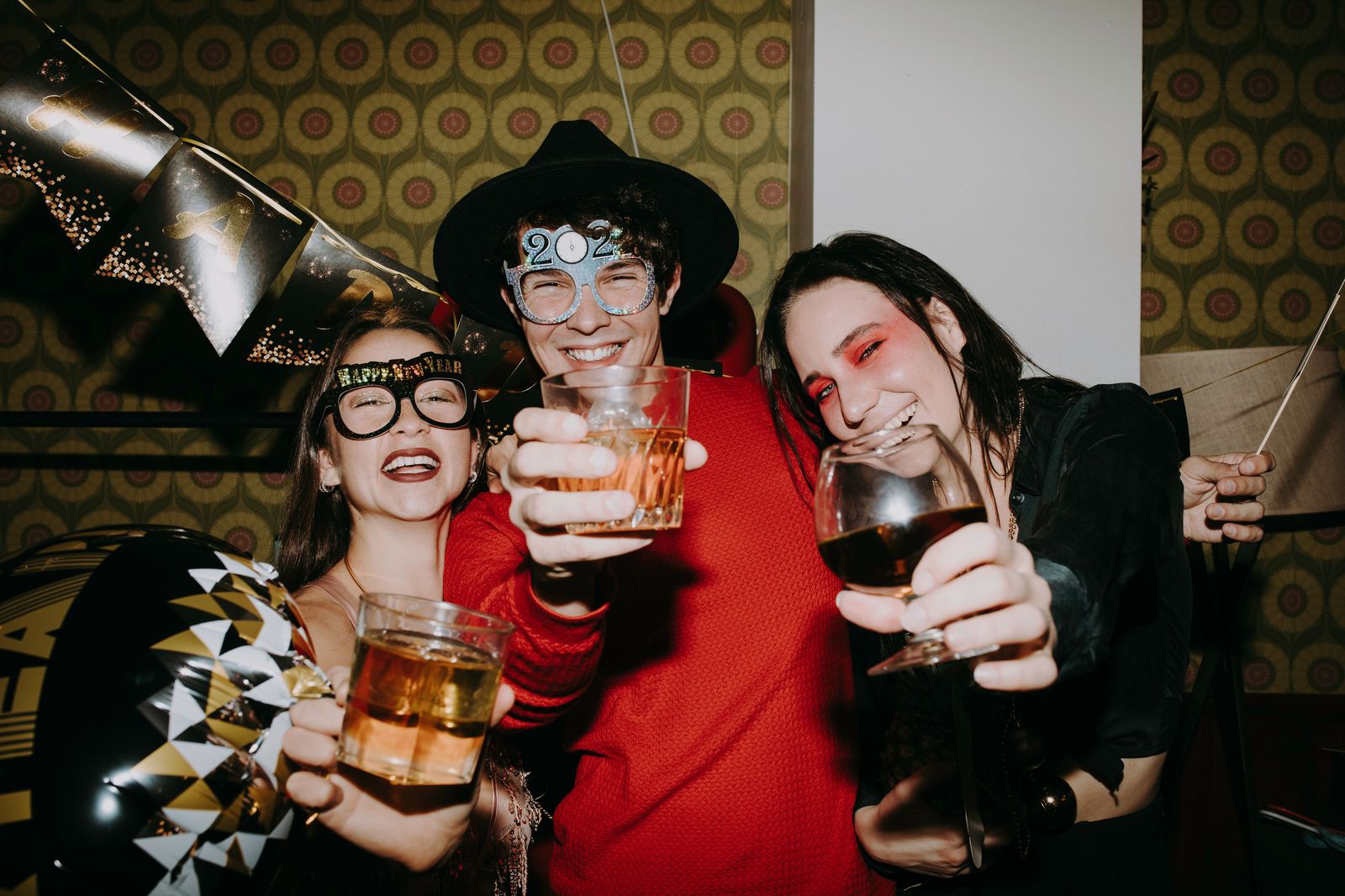 A group of friends celebrating together on a night out in Hamilton