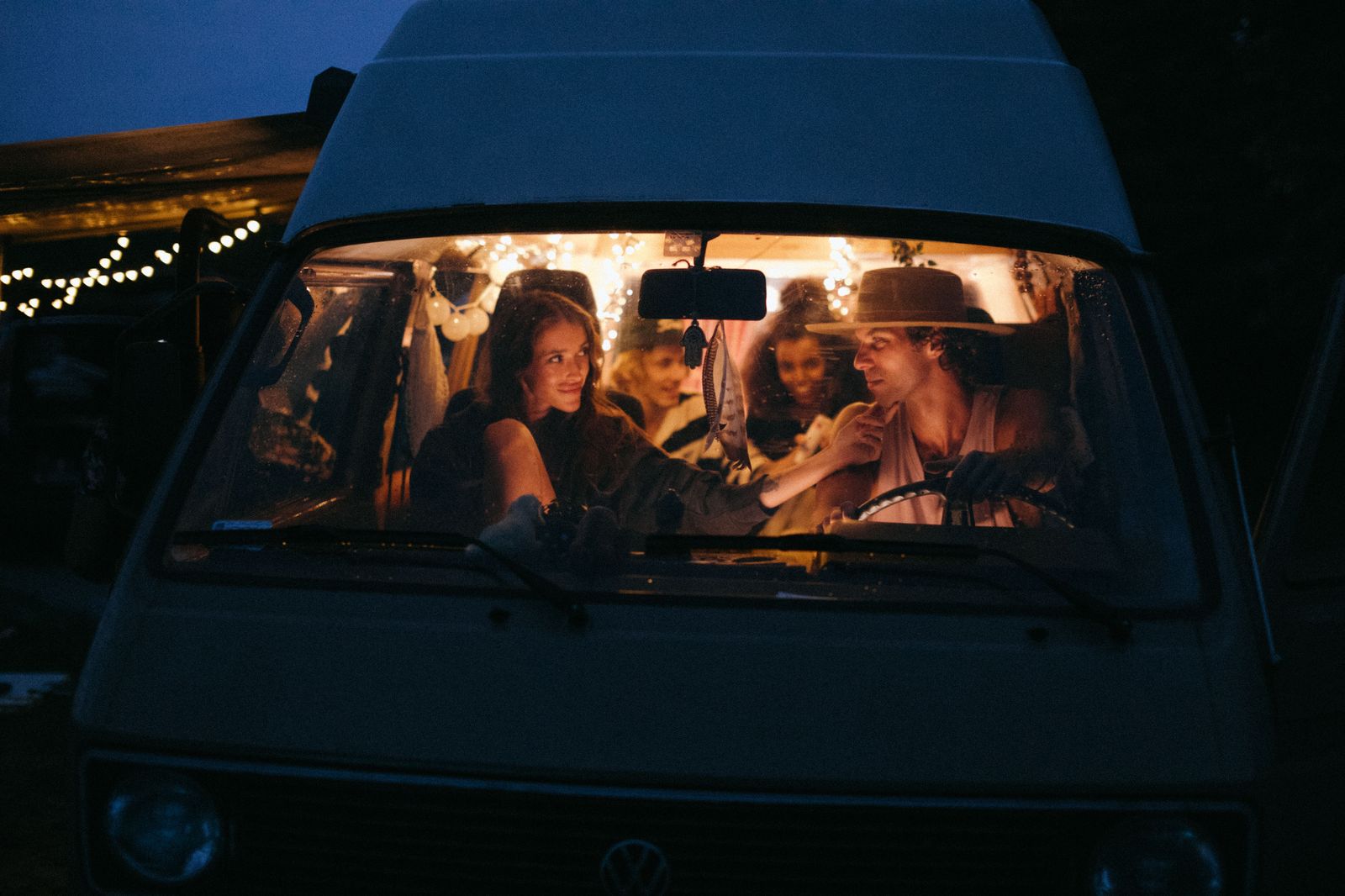 A group of friends travelling together in the cabin of an executive Sprinter