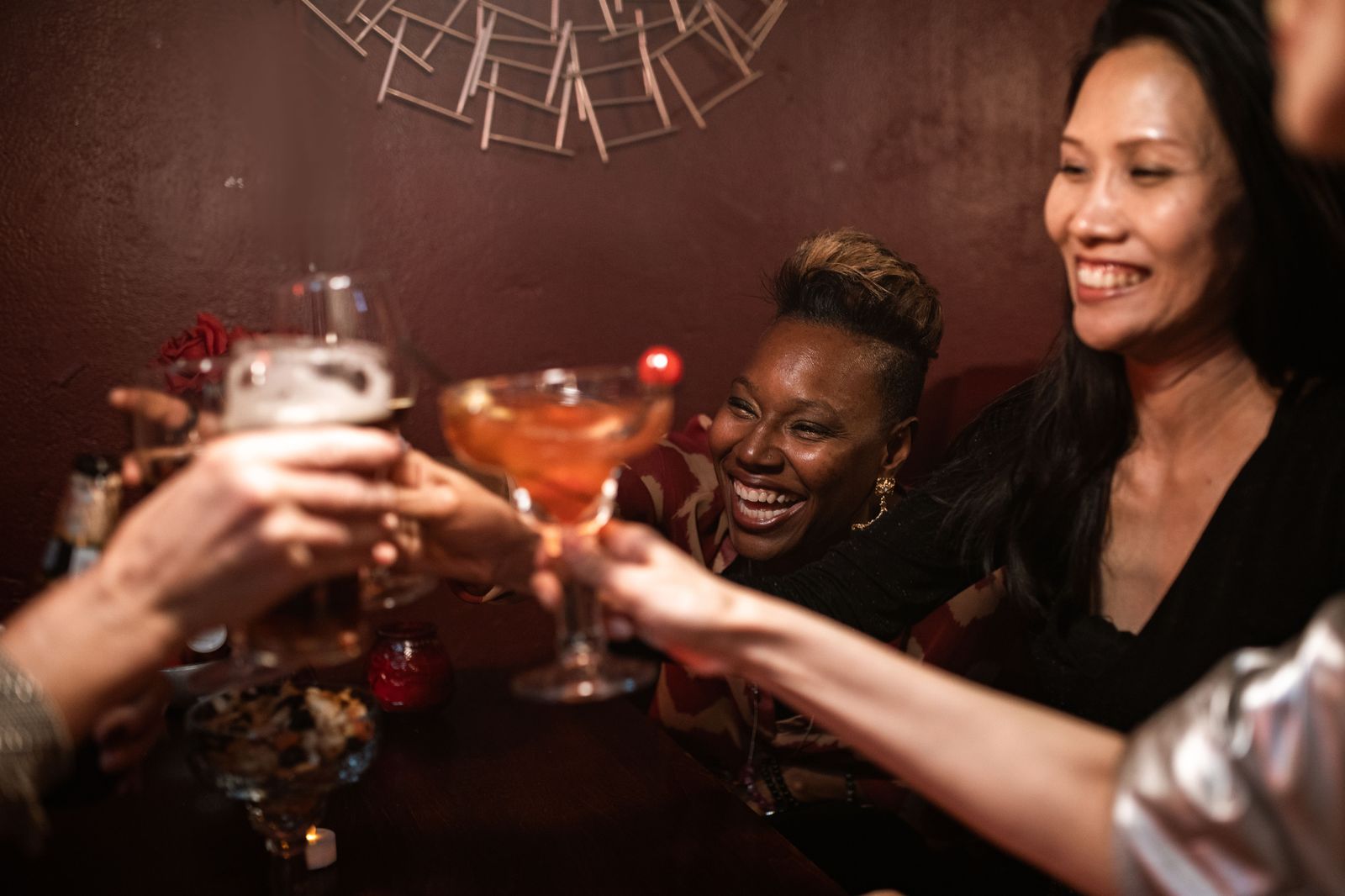 A group raising glasses inside a stretch limousine before a night out in Hamilton